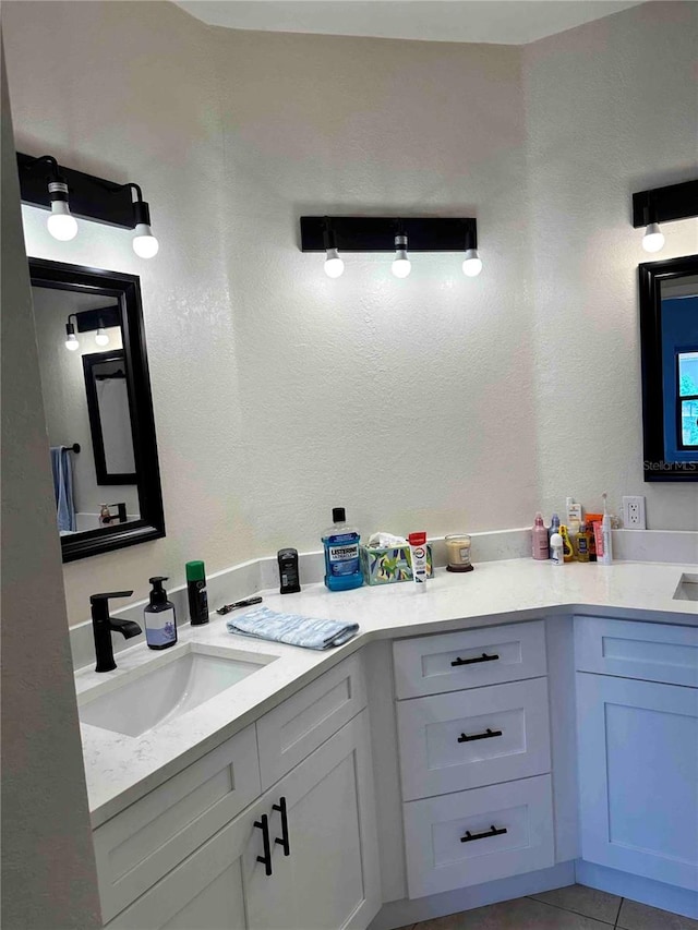 bathroom featuring vanity and tile patterned flooring