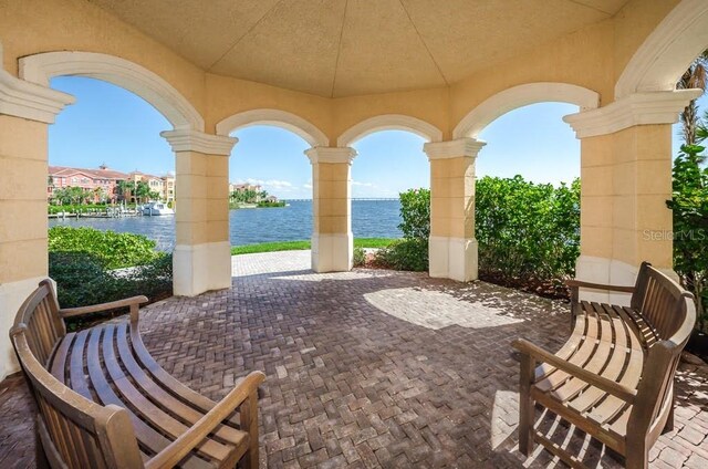 view of patio / terrace featuring a water view