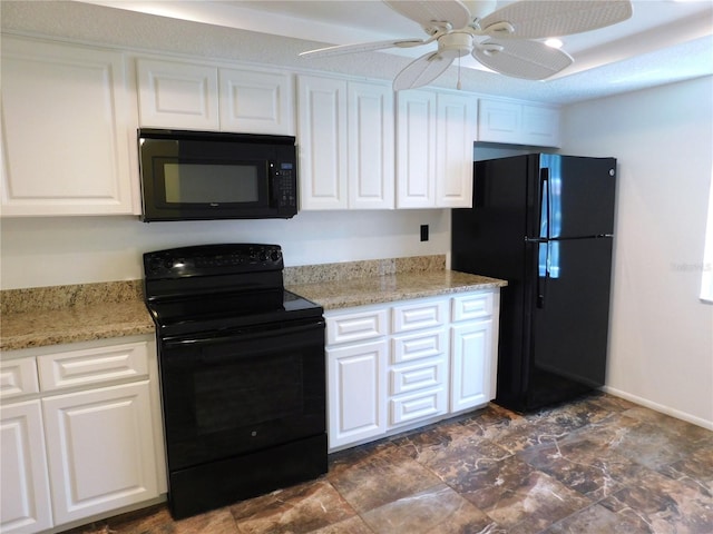 kitchen with black appliances, ceiling fan, white cabinets, and light stone counters