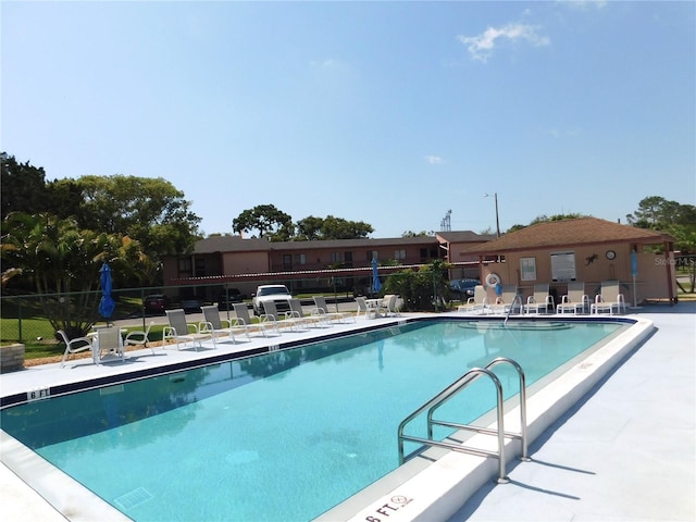 view of pool featuring a patio area