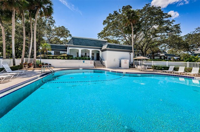 view of swimming pool featuring a patio