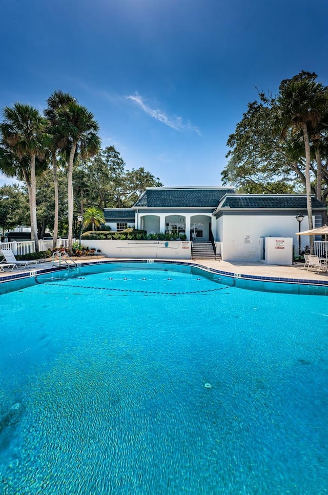 view of swimming pool featuring a patio area