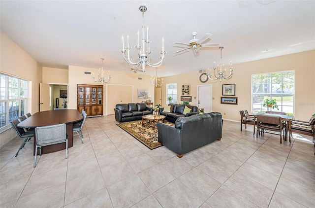 living room with light tile patterned floors, ceiling fan, and a healthy amount of sunlight