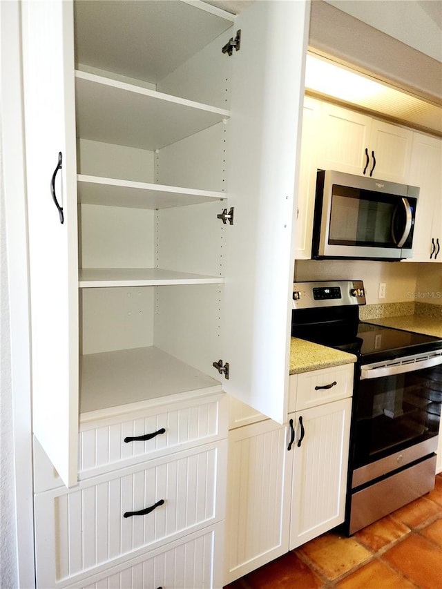 kitchen with white cabinets and stainless steel appliances