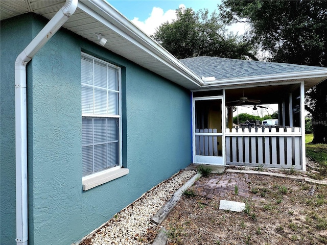 view of property exterior with ceiling fan