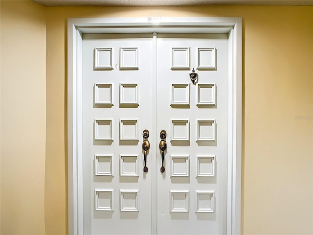 view of exterior entry with french doors