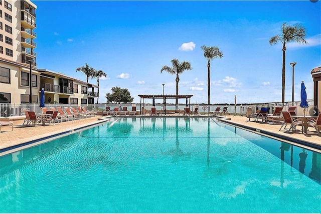 view of pool featuring a patio area and a pergola