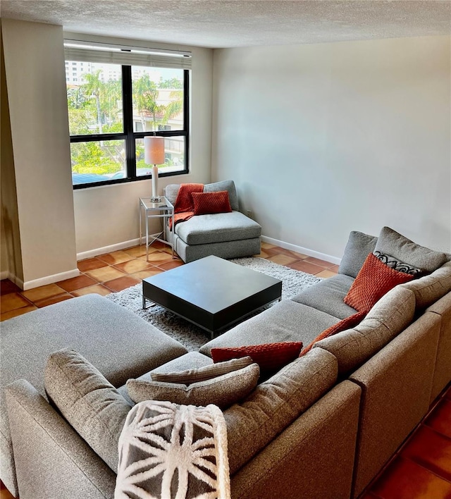 tiled living room with a textured ceiling