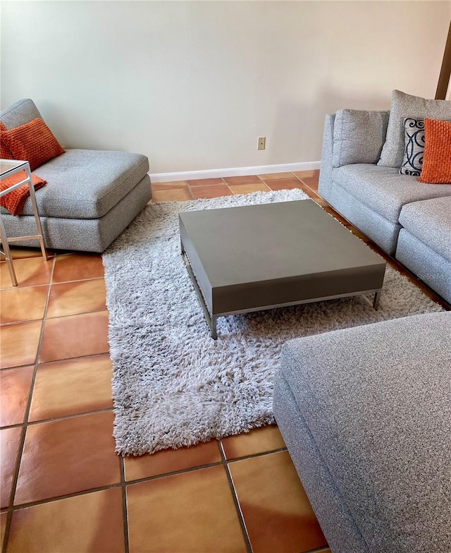 living room with tile patterned floors