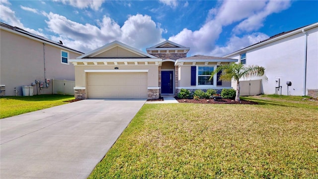 view of front of property featuring a garage and a front yard