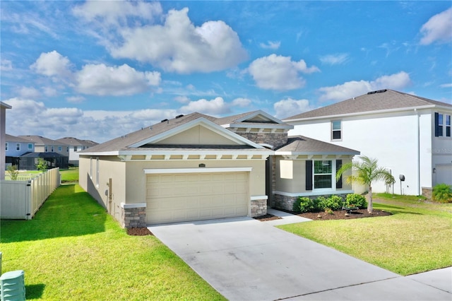 view of front facade featuring a garage and a front lawn