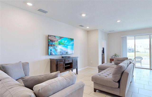 living room featuring light tile floors