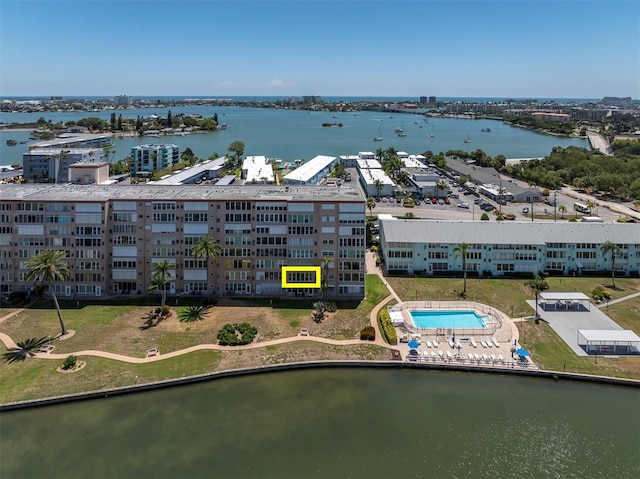 birds eye view of property featuring a water view