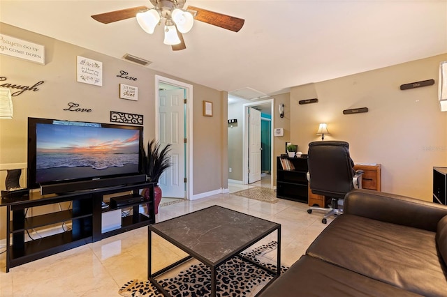 living area with a ceiling fan, marble finish floor, visible vents, and baseboards