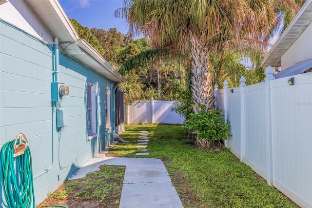 view of yard with a fenced backyard