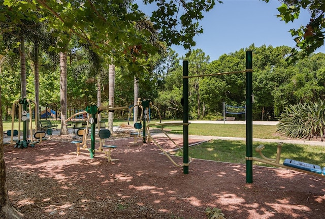 surrounding community featuring a lawn and playground community