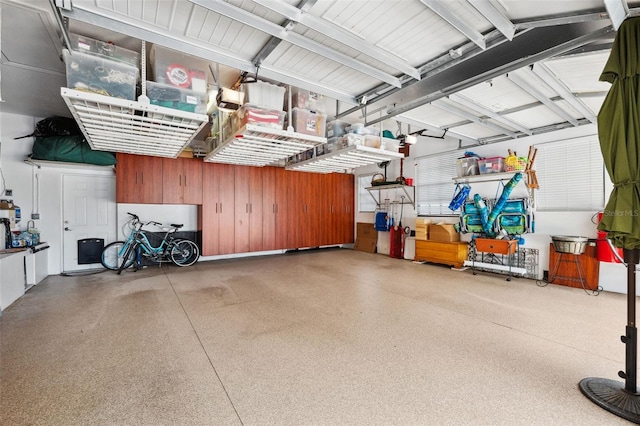 garage featuring a garage door opener