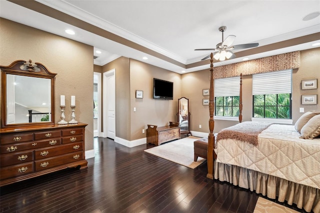 bedroom featuring dark wood-type flooring, crown molding, baseboards, and recessed lighting