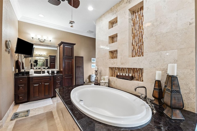 full bathroom featuring ceiling fan, a bath, vanity, and ornamental molding