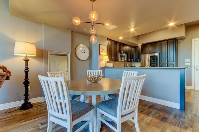 dining room featuring hardwood / wood-style floors