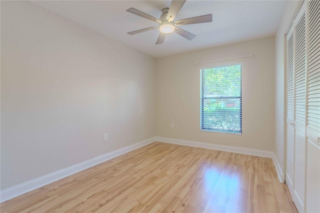 unfurnished bedroom featuring a closet, ceiling fan, and light hardwood / wood-style flooring