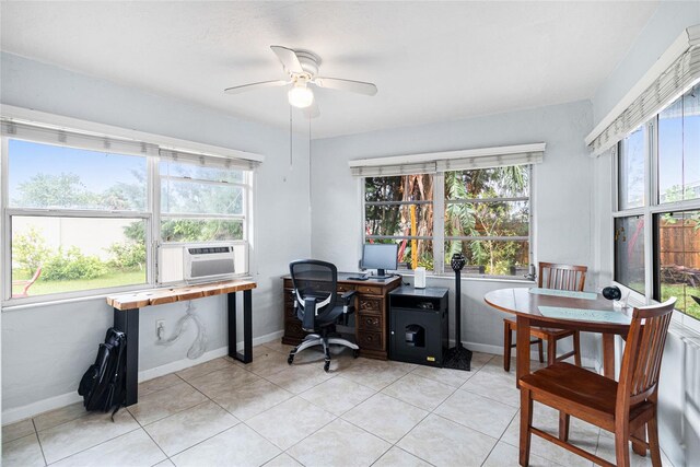 tiled home office with plenty of natural light, cooling unit, and ceiling fan