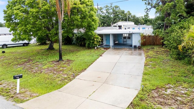 view of front of property with a front lawn