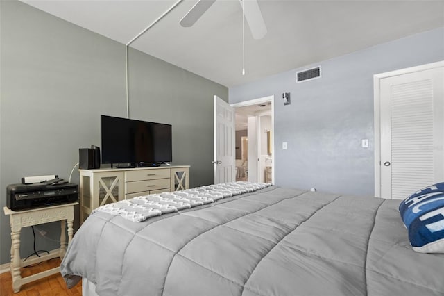 bedroom featuring ceiling fan and wood-type flooring