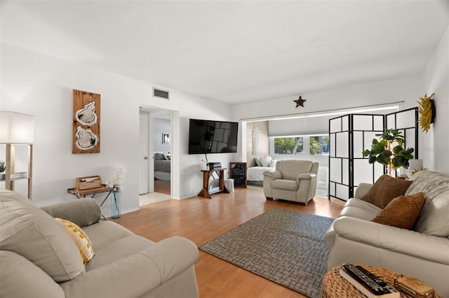 living room featuring light wood-type flooring