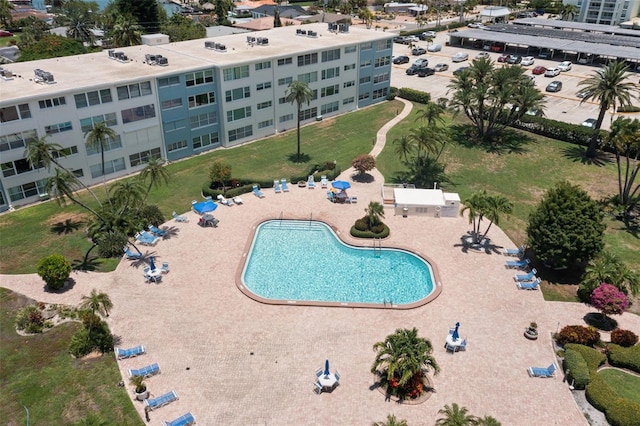 view of swimming pool featuring a patio area