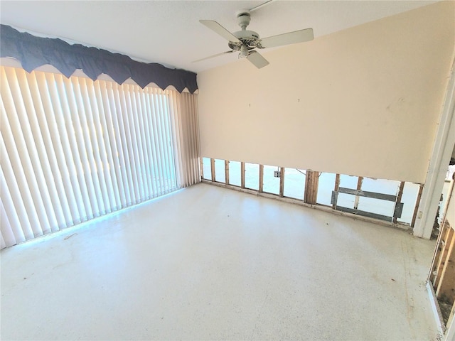 unfurnished room featuring ceiling fan