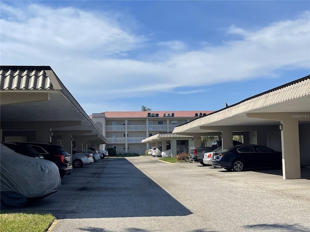 view of car parking featuring a carport