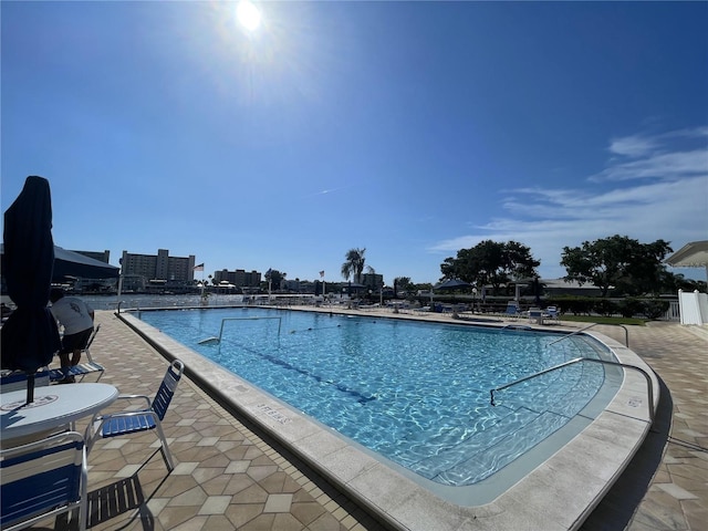 view of pool featuring a patio