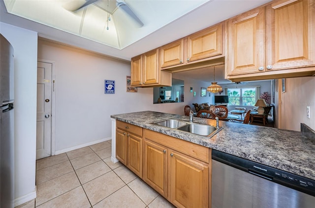 kitchen featuring stainless steel dishwasher, ceiling fan with notable chandelier, sink, light tile patterned floors, and hanging light fixtures