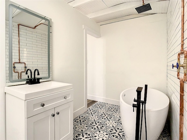 bathroom featuring a bathtub and vanity