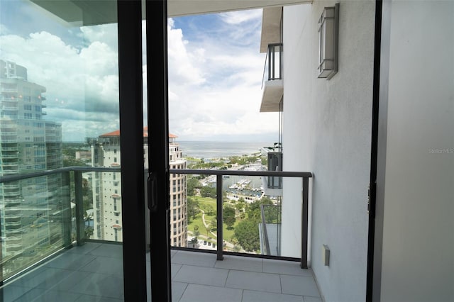 balcony featuring a water view