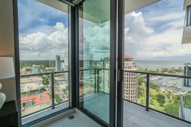 balcony featuring a water view