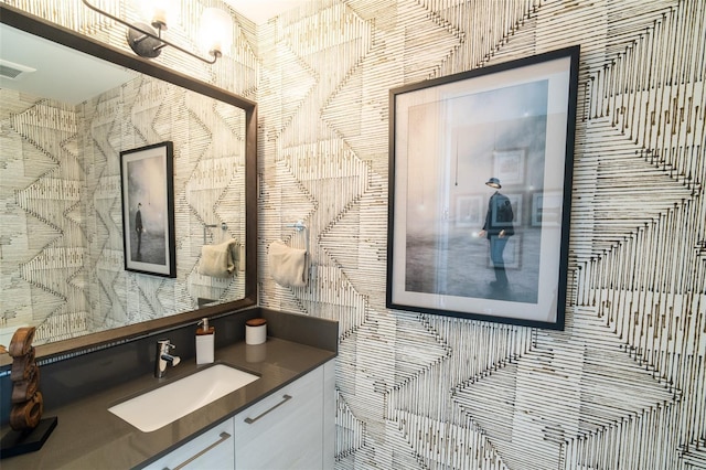 bathroom with visible vents and vanity