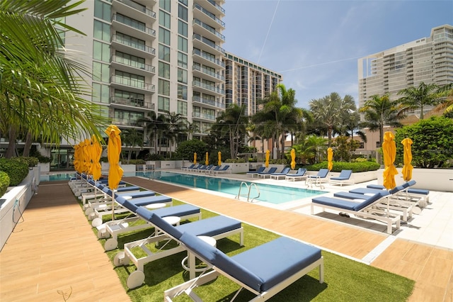 view of swimming pool featuring a patio area