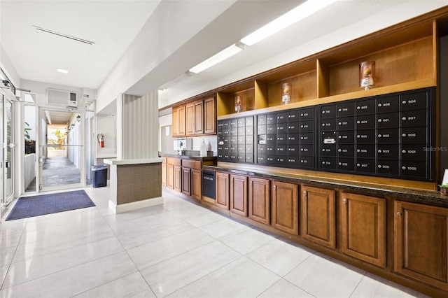 kitchen with light tile patterned floors