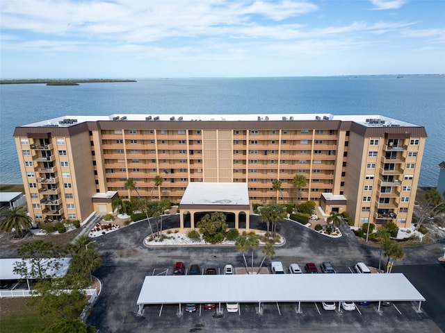 view of building exterior with a water view