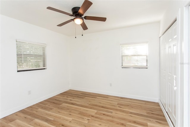 unfurnished room featuring ceiling fan and light hardwood / wood-style floors