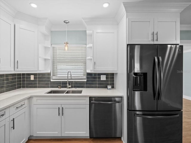 kitchen with stainless steel appliances and white cabinets