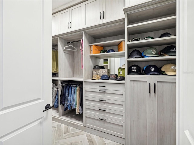 walk in closet featuring light parquet floors