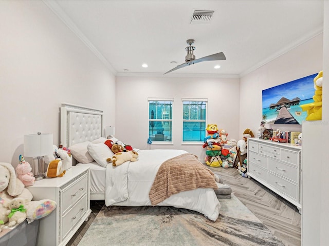 bedroom with ceiling fan, ornamental molding, and light parquet flooring