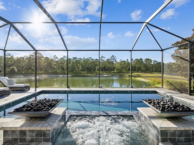 view of swimming pool featuring pool water feature, a lanai, and a water view