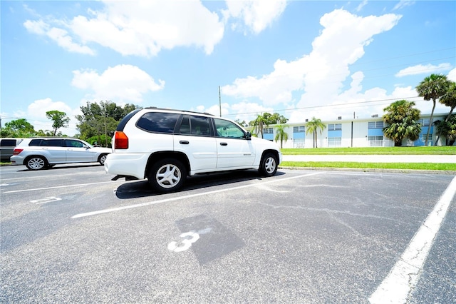 view of parking / parking lot