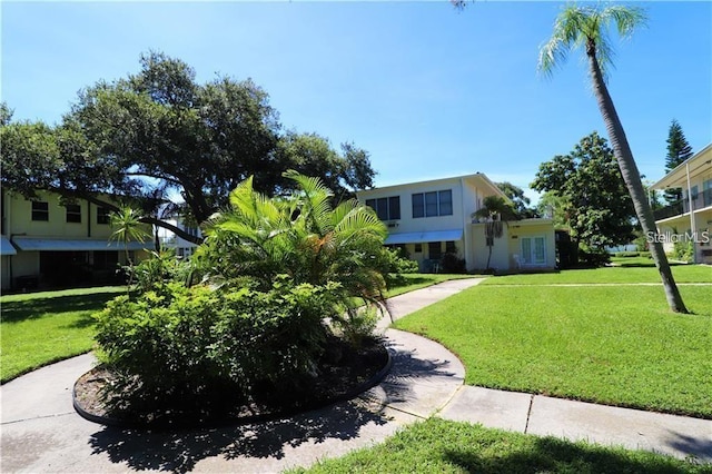 view of front of home featuring a front lawn