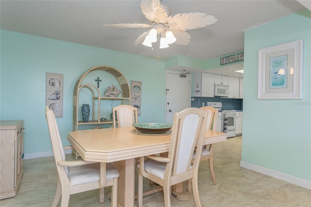 dining area featuring ceiling fan