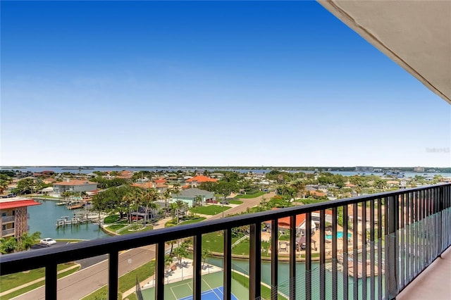 balcony featuring a water view